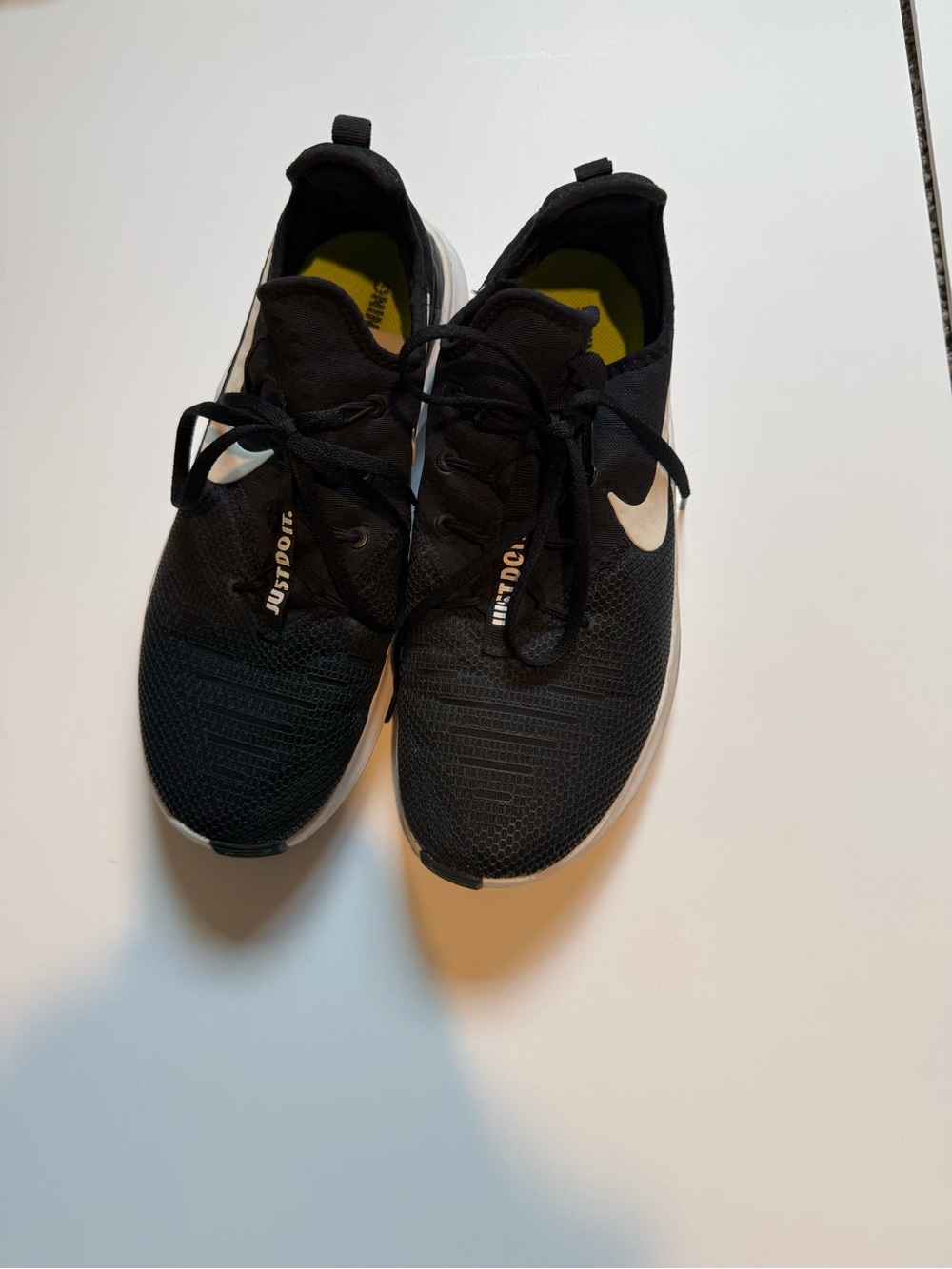 Nike Women’s Black Athletic Sneakers with White Swoosh